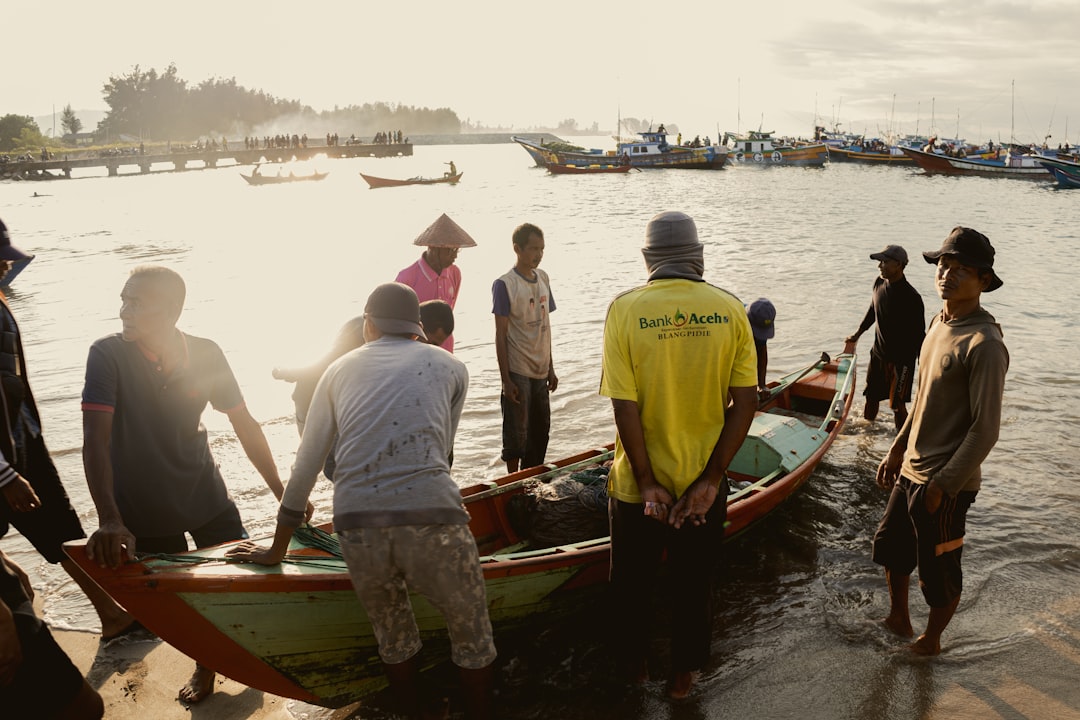 People Gathering Around Boat